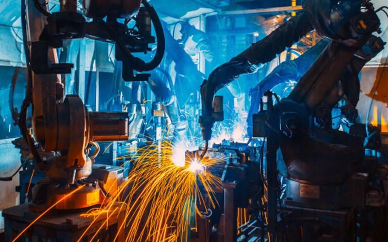 Make data-driven decisions for adapting and optimizing Close up of manufacturing machines