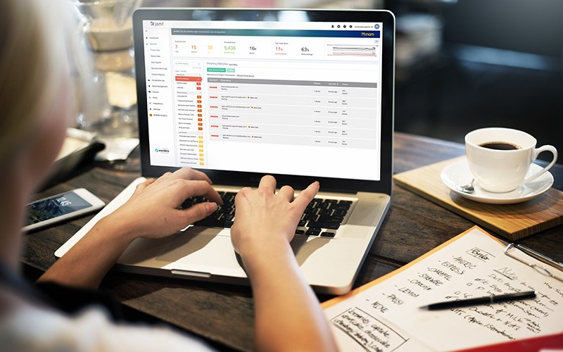 Your Apple® devices are targets for determined attackers. Student using laptop
