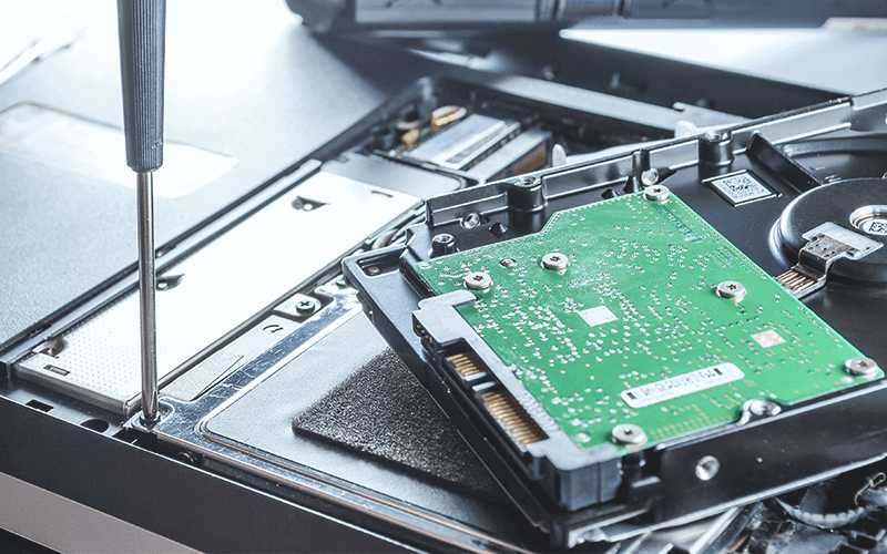 Stretch your budget while getting the computing power you need. Man fixing laptop