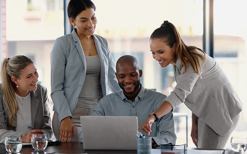 LastPass team solutions Teammates working together at the office