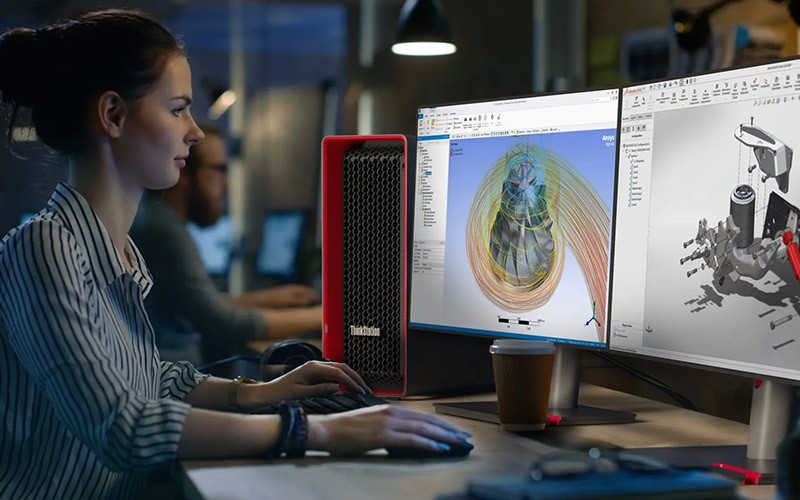 lenovo-workstation-amd-ryzen-threadripper-pro Woman working on Lenovo workstation with AMD Ryzen Threadripper Pro