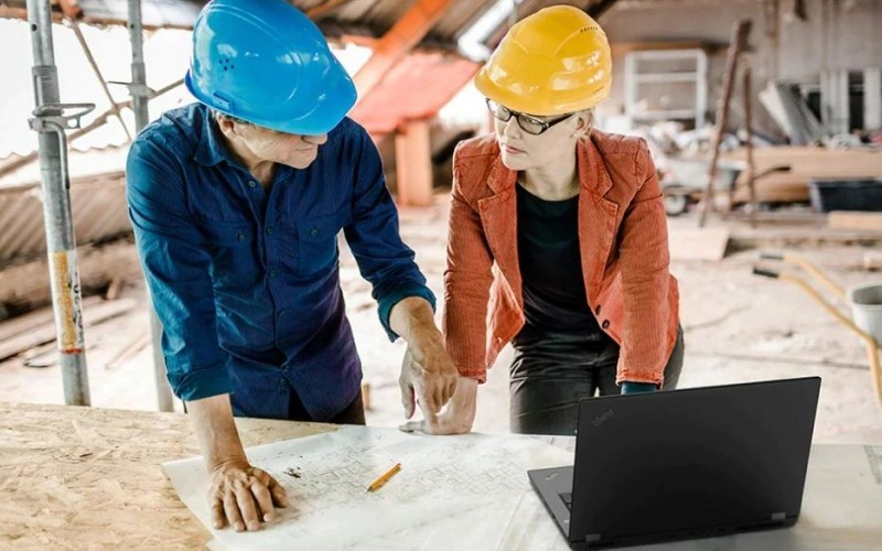 workers-on-site Two users working in construction site with ThinkPad P16s