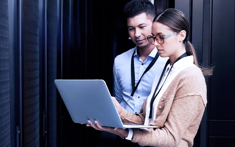 Complete hybrid coverage Teammates collaborating together at the office