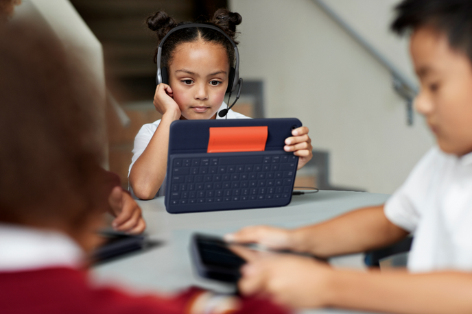 Embrace iPad-based learning A kid using iPad for learning