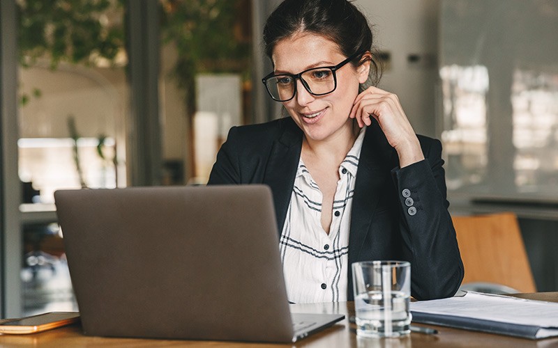 Find and fix vulnerabilities in every application — on premises or in the cloud. Professional working on her laptop