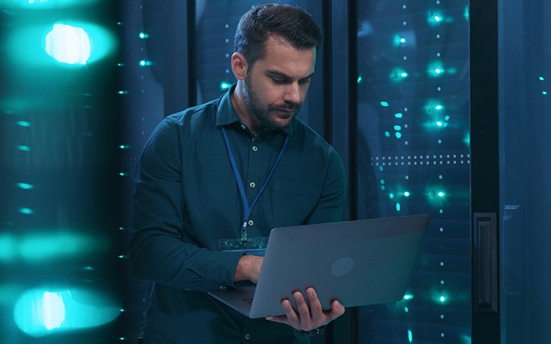 Encrypt both unstructured and structured data with persistent protection Professional using laptop