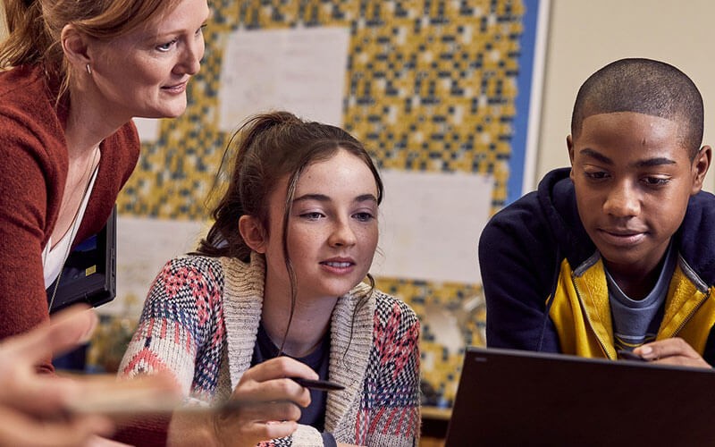 Office 365 from Microsoft 365, educators can build curriculums with familiar apps and collaborate from anywhere Student using laptop with teacher