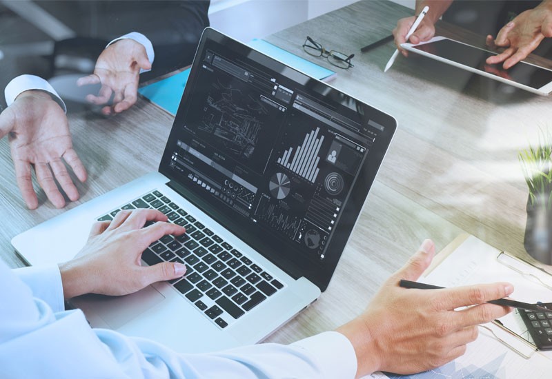 Manage data growth using cloud compute Close-up of business man hands using laptop device and data management system