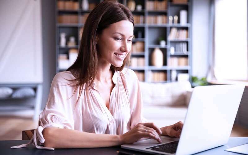 Modern remote work solutions Woman using a laptop
