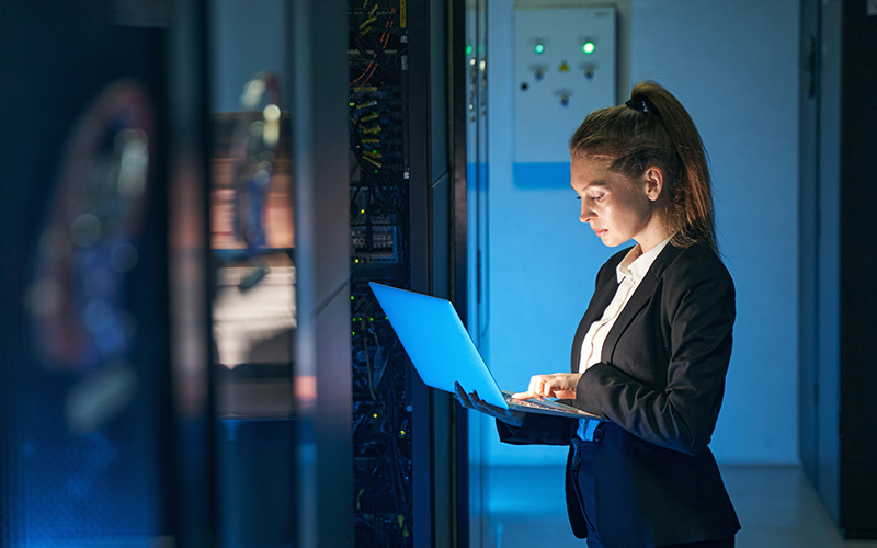 By detecting threats earlier, you can make more intelligent authentication decisions. Woman using a laptop