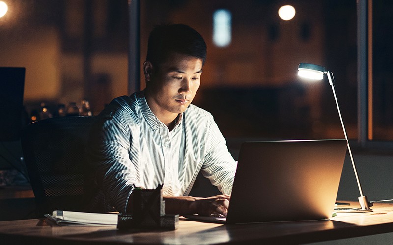 This cloud-native security platform is a 24/7 managed detection and response service Professional working on laptop