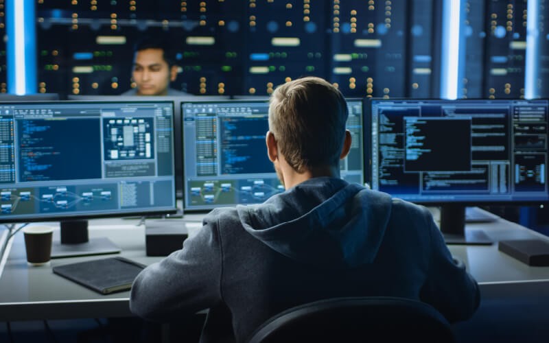 Zero Trust Network Access Man coding at the office