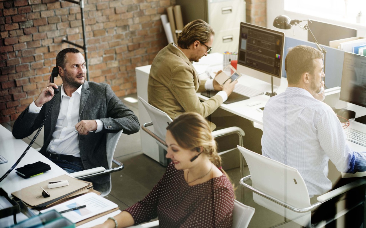 Archive and retrieve to and from anywhere Teammates working together at the office