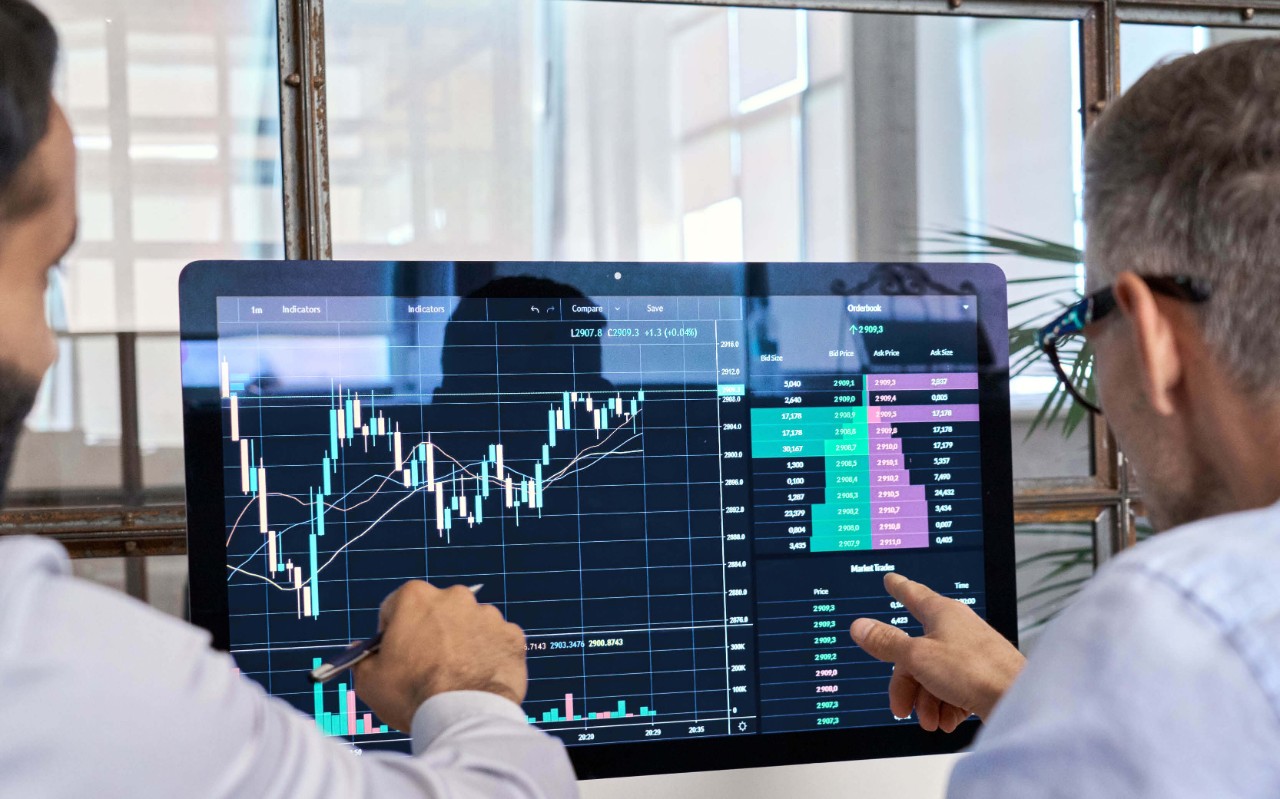 Unified IT analytics and insights Two man working together