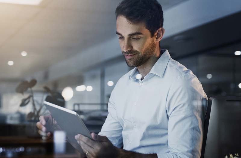 Reap the benefits of both the public and private cloud Business professional using cloud applications