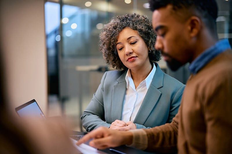 Woman working in store with tech Woman working in store with tech