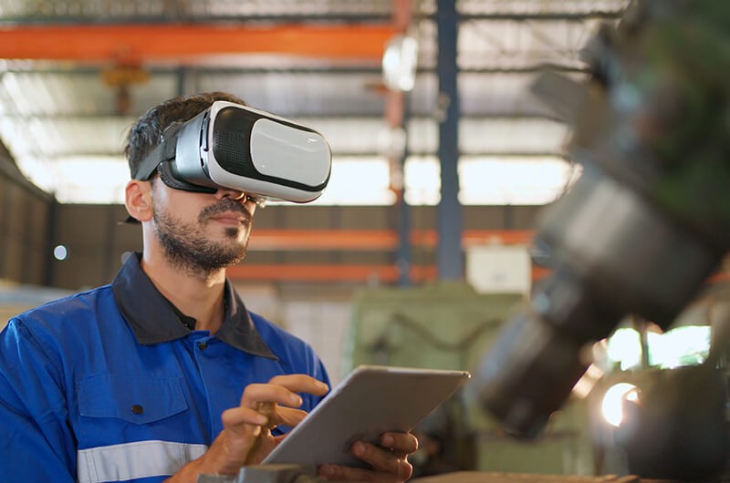 engineer-wearing-virtual-headset-in-manufacturing-factory engineer-wearing-virtual-headset-in-manufacturing-factory